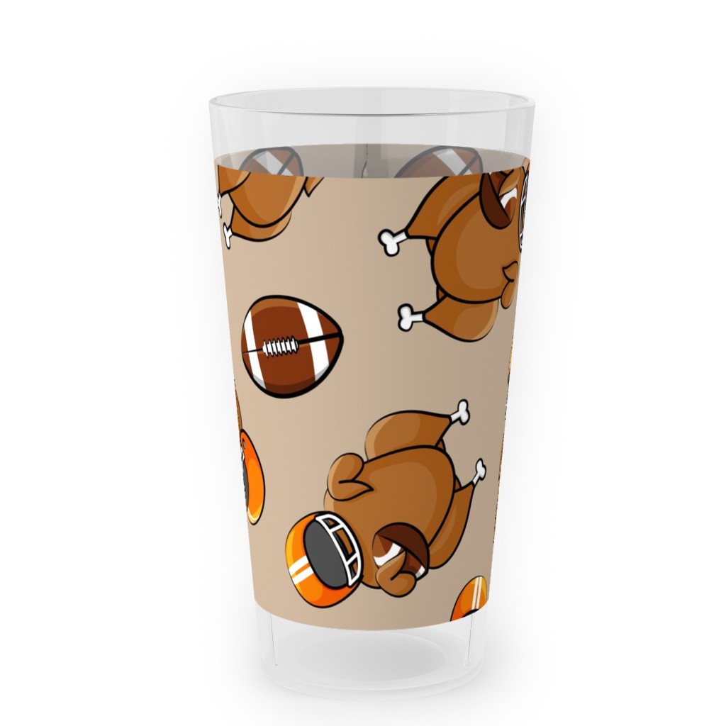 Football Turkey With Helmet and Football - Orange on Tan Outdoor Pint Glass, Beige