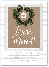 rustic wreathed door moving announcement